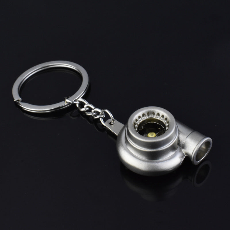 Spinning turbocharger metal keychain