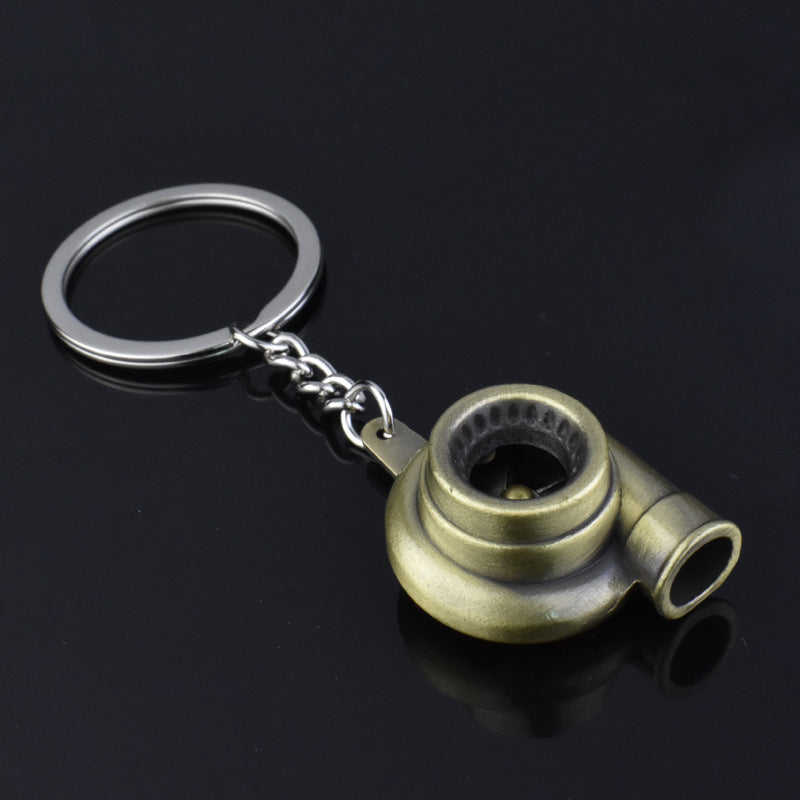 Spinning turbocharger metal keychain