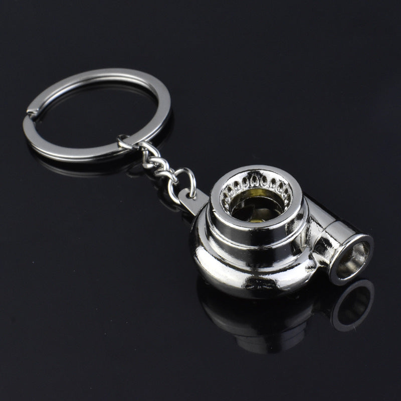 Spinning turbocharger metal keychain