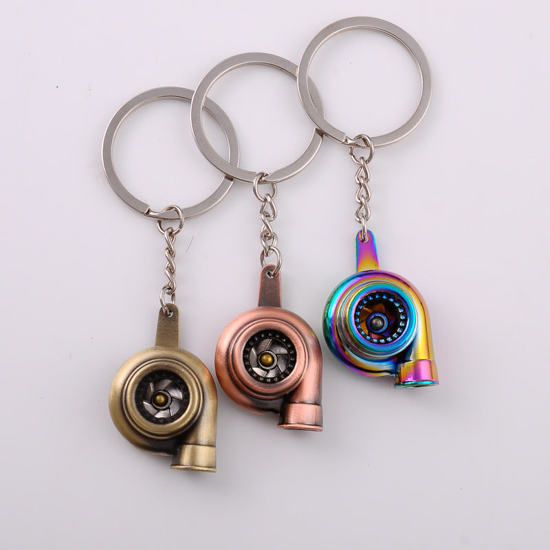 Spinning turbocharger metal keychain