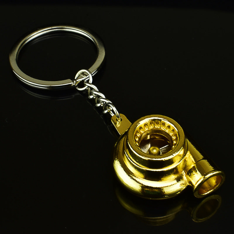 Spinning turbocharger metal keychain